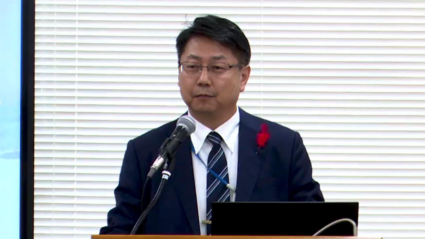 開会挨拶する関村静雄審議官（PC画面のスクリーンショット）
